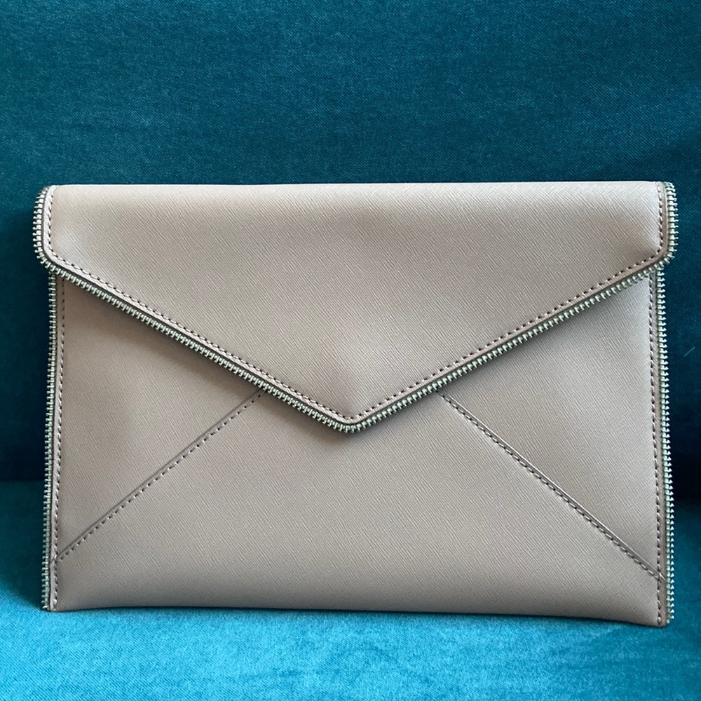 Like new Rebecca Minkoff cream envelope clutch with dust cover